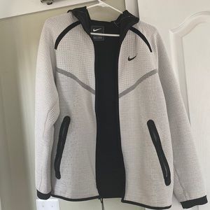 Light gray with black edging. In great condition, barely worn.